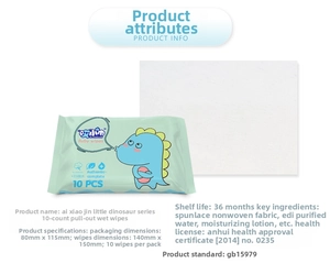 Close-up of portable baby wipes with cute dinosaur pattern and 10-piece pack detail