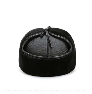 Rear view of winter trapper hat with black faux fur and textured leather paneling
