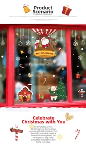 Detail of Christmas window stickers featuring Santa in hot air balloon and festive snowmen