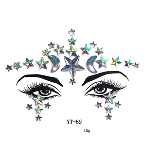 Detailed view of YT-69 iridescent face jewels with star and moon resin crystal shapes
