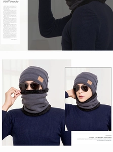 Detailed view of winter knitted hat and neck warmer with thick faux rabbit fur lining