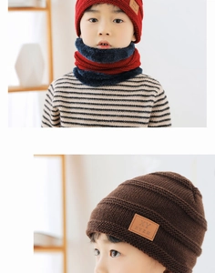 Close-up of thick knitted winter hat and scarf set showing warm thermal fabric texture