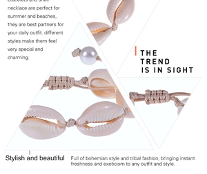 Detailed view of handmade bohemian shell bracelet with white pearls and woven cord texture