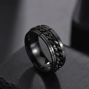 Detail of matte black rotatable Cuban chain ring for men made of durable stainless steel