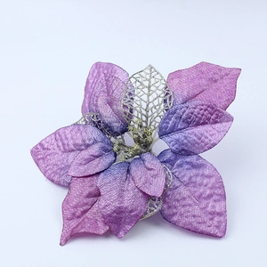 Close-up of 22cm purple gradient poinsettia flower with silver glitter and mesh leaves