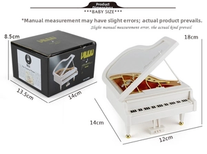 Detailed size chart for white mini piano music box with product and package dimensions