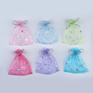 Organza gift bags with silver star moon patterns in various colors and drawstring closures
