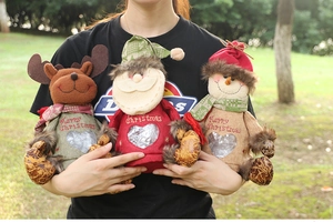 Three Christmas burlap gift bags with Reindeer, Santa, Snowman and heart-shaped windows