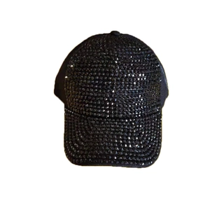 Fashionable black baseball cap for women fully covered in sparkling rhinestones