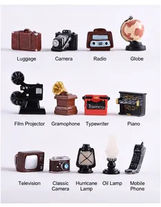 Macro view of detailed vintage resin miniatures including retro camera and gramophone