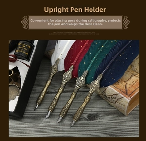 Vintage quill pen set with bronze metallic embossed barrel and multiple feather colors