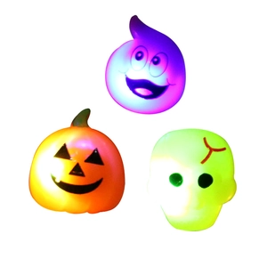 Halloween LED glowing rings featuring orange pumpkin, purple ghost, and green skull designs
