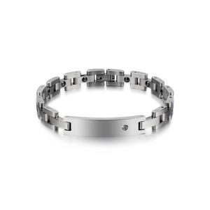Detail of silver titanium steel magnetic bracelet featuring a rectangular bar and diamond