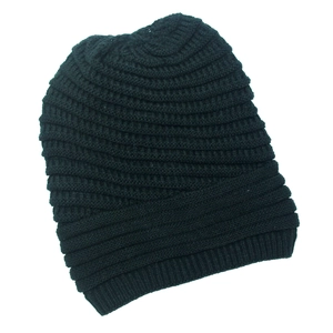 Close-up of thick horizontal rib knit texture on a black winter beanie hat