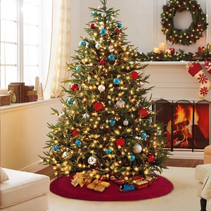 Detailed knit texture of a dark red Christmas tree skirt in a cozy home setting