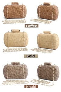 Detail of hand-woven straw clutches with elegant gold metal clasps and chain straps