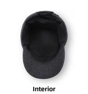 Detail of gray wool blend army cap interior showing foldable ear protection lining