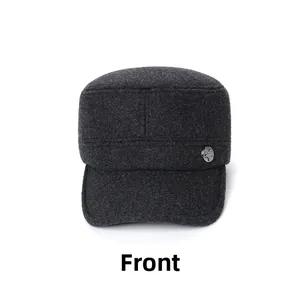 Detailed close-up of dark grey wool cadet cap with decorative star metal button