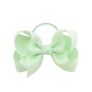 Light green grosgrain ribbon bow hair tie for girls on a clean white background