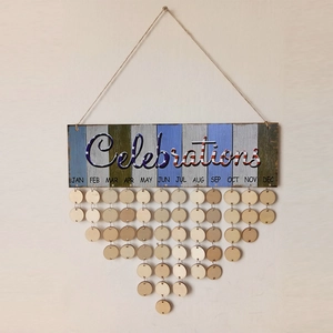 Detail of wooden celebration calendar with US flag design and dangling round date tags