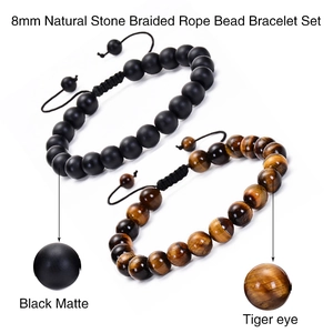 Detail of 8mm matte black and red tiger eye stone beads on handmade braided bracelets