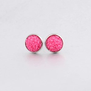 Macro shot of 10mm round pink drusy stud earrings with polished silver metal frame
