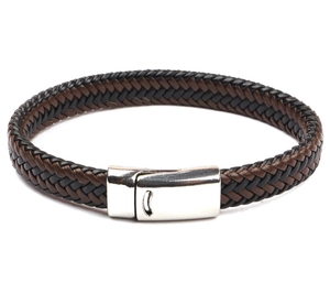 Close-up of brown and black braided leather bracelet with silver magnetic buckle