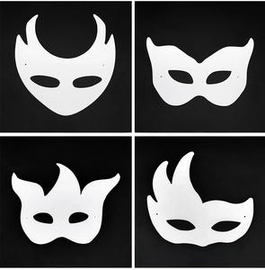 Detailed view of four blank DIY pulp masks in various shapes for creative hand painting