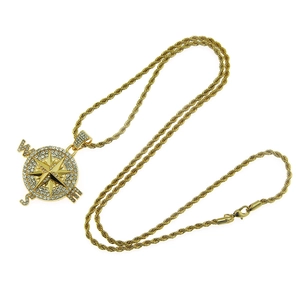 Hip hop style gold compass pendant with sparkling rhinestones on a twist chain
