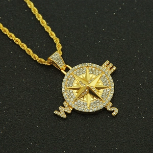Hip hop style gold compass pendant necklace with sparkling crystals on rope chain