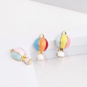 Colorful hot air balloon alloy pendant with white clouds on a white step background