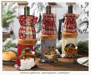 Detail of Christmas wine bottle covers with Santa, Snowman and Reindeer motifs