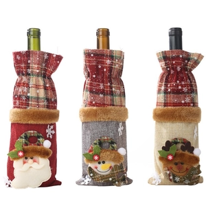 Three Christmas wine bottle covers featuring Santa, snowman, and reindeer with plaid design