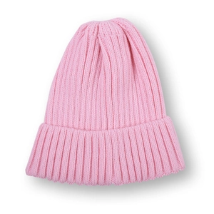 Close-up of pink ribbed knit beanie showing thick texture and folded cuff detail