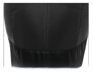 Detailed macro view of reinforced stitching and breathable mesh fabric on black cap top
