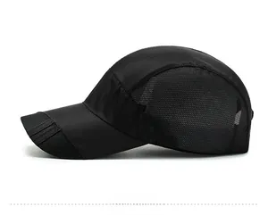 Detail view of black quick-dry baseball cap with breathable mesh side panels
