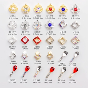 Macro view of alloy nail art charms in crown and drop shapes with detailed size specs