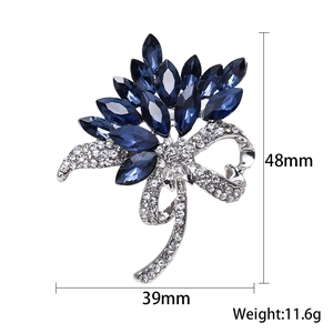 Deep blue marquise crystal flower brooch with bow detailing, size 39mm x 48mm, 11.6g weight