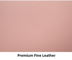 Close-up of premium pink lychee grain leather texture with soft matte finish
