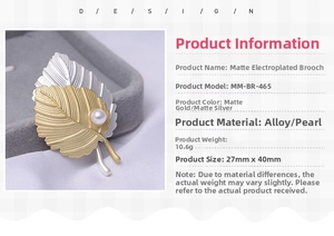 Detail view of matte leaf brooch with white pearl showing alloy material and 40mm size