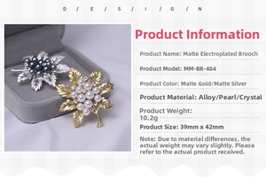 Detailed view of matte leaf brooches with pearls and rhinestones measuring 39mm by 42mm