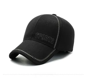 Detail view of winter baseball cap showing white contrast stitching and SPORTS embroidery