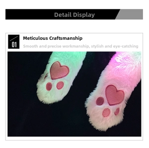 Close-up of plush cartoon animal paw with pink heart-shaped pads and neat stitching