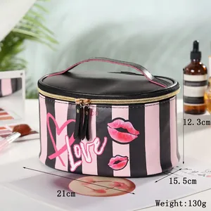 Detailed size view of striped PU makeup bag with Love print and dimensions 21x15.5x12.3cm