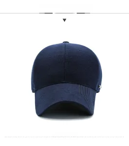 Detail showing dark blue wool baseball cap for men with side metal buckle ornament