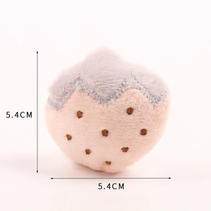Detailed view of pink and grey plush fruit charm with embroidery and 5.4cm measurement