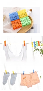 Close-up of 20 colorful plastic laundry pegs with serrated jaws for windproof drying