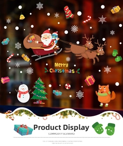 Detail of Christmas window stickers featuring Santa, reindeer and snowman decals