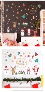 Close-up of Santa Claus, reindeer and snowman decals with Merry Christmas art lettering
