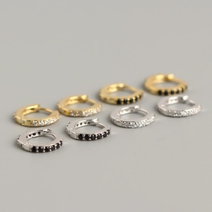 925 sterling silver huggie earrings set with white and black crystals in gold and silver